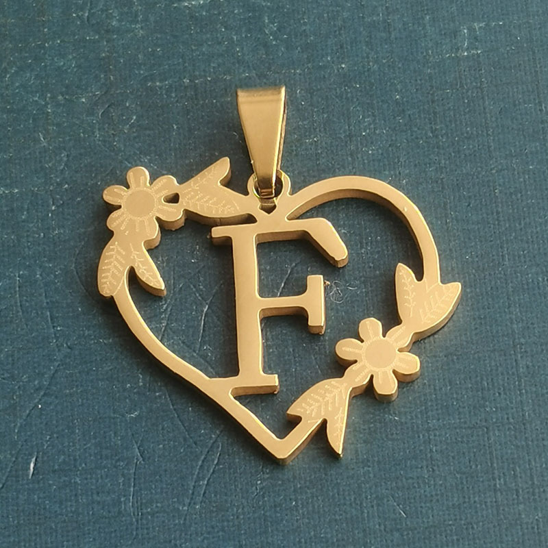 F gold pendant