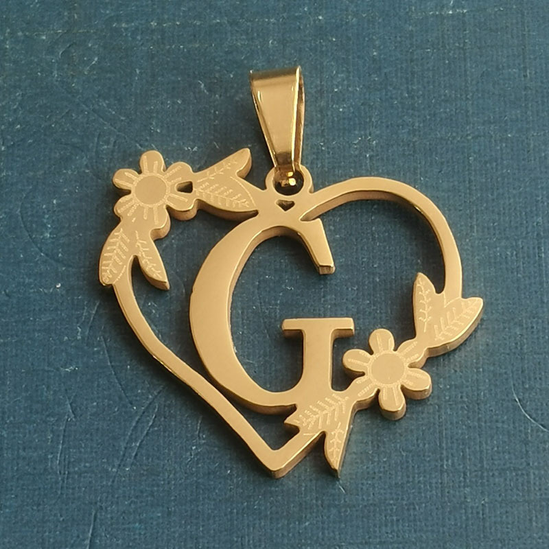 G gold pendant