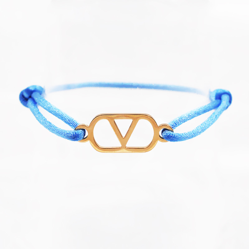 Light blue rope   gold accessories