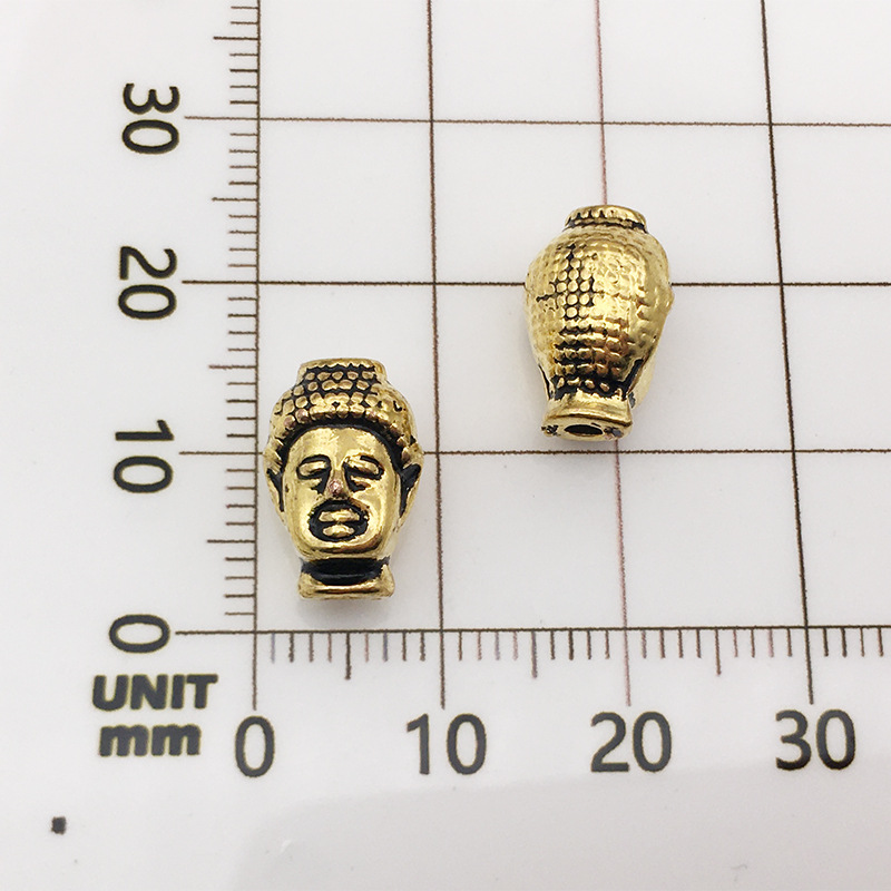 10154-antique gold Buddha head-8x13-1.5mm