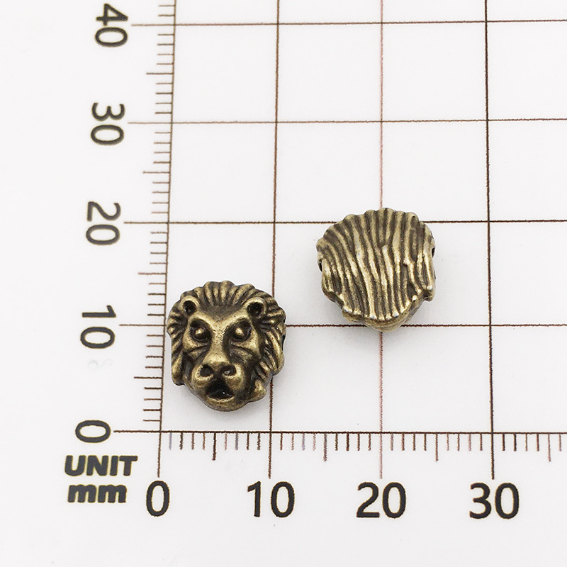 10117-antique  Bronze Lion Head-10x12-1.5mm