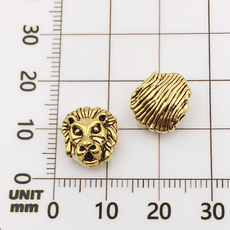 10118-antique gold lion head-10x12-1.5mm