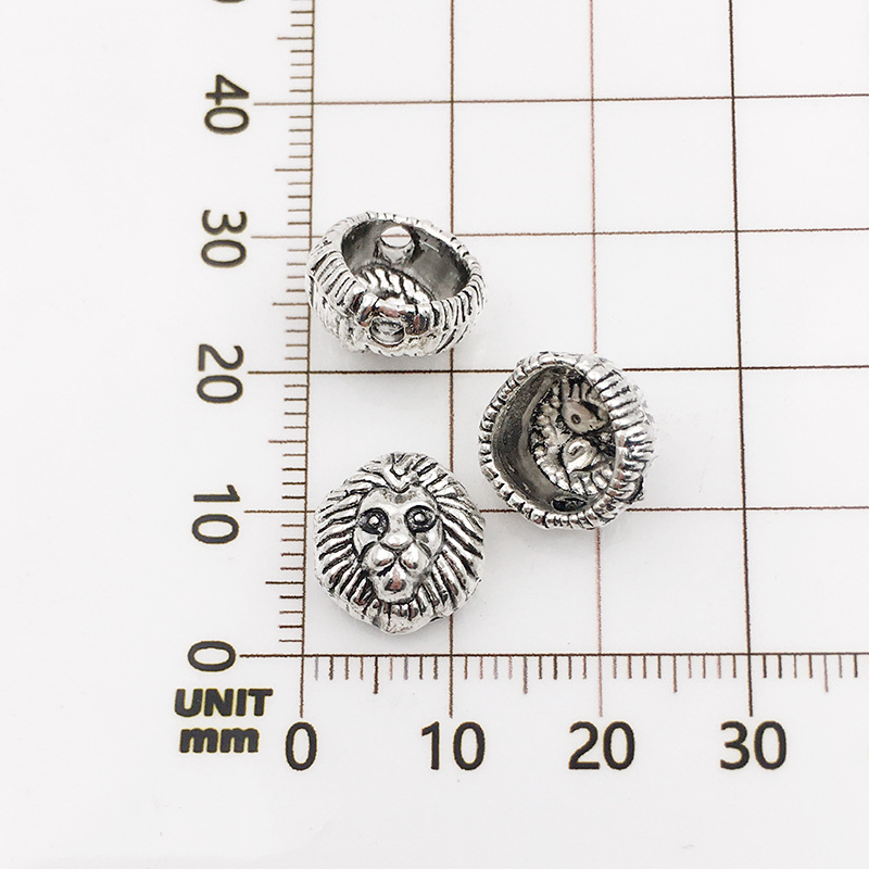 10128-antique silver lion head-12x12-1.5mm