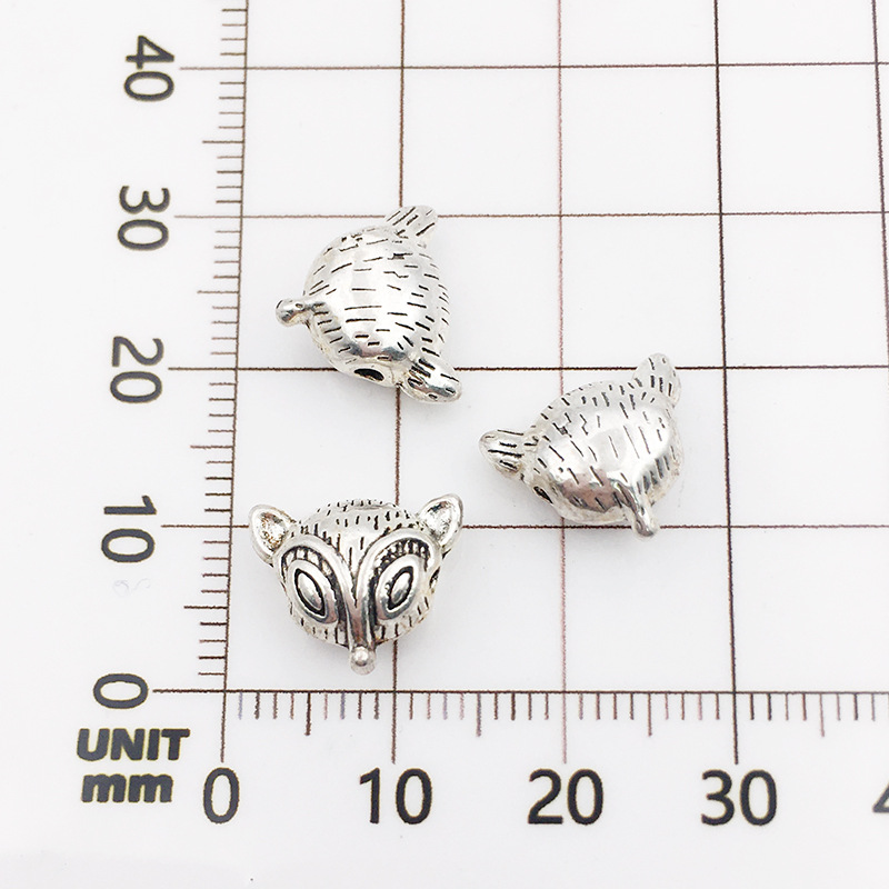 10131-antique silver fox head 10x12-1.5mm