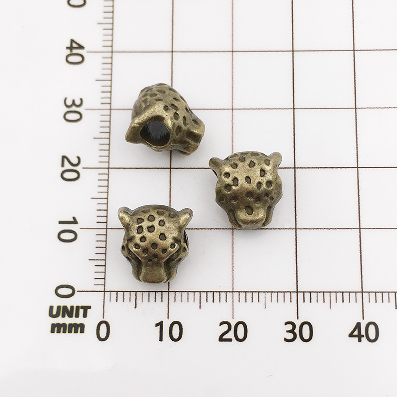 10114-antique  Bronze Leopard Head-10x12-4mm