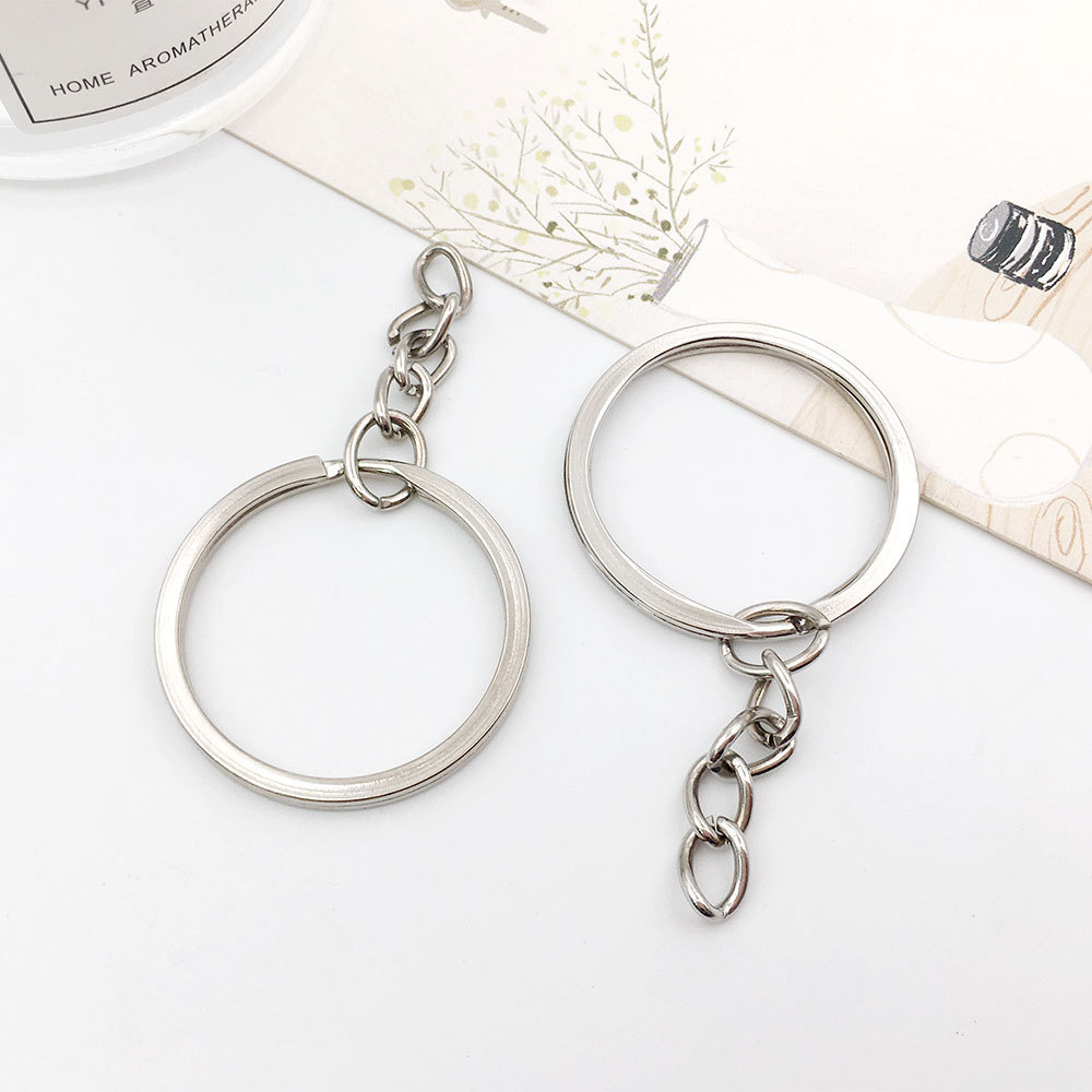 White K key ring with chain