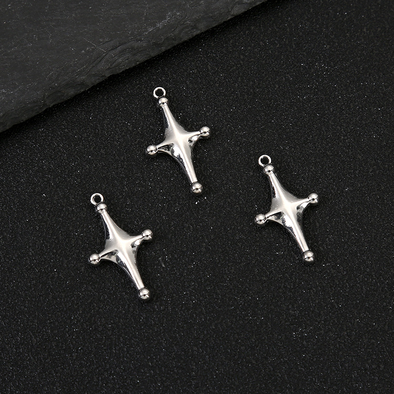 Cross star (about length: 3cm width: 1.7cm thickness: 0.3cm)