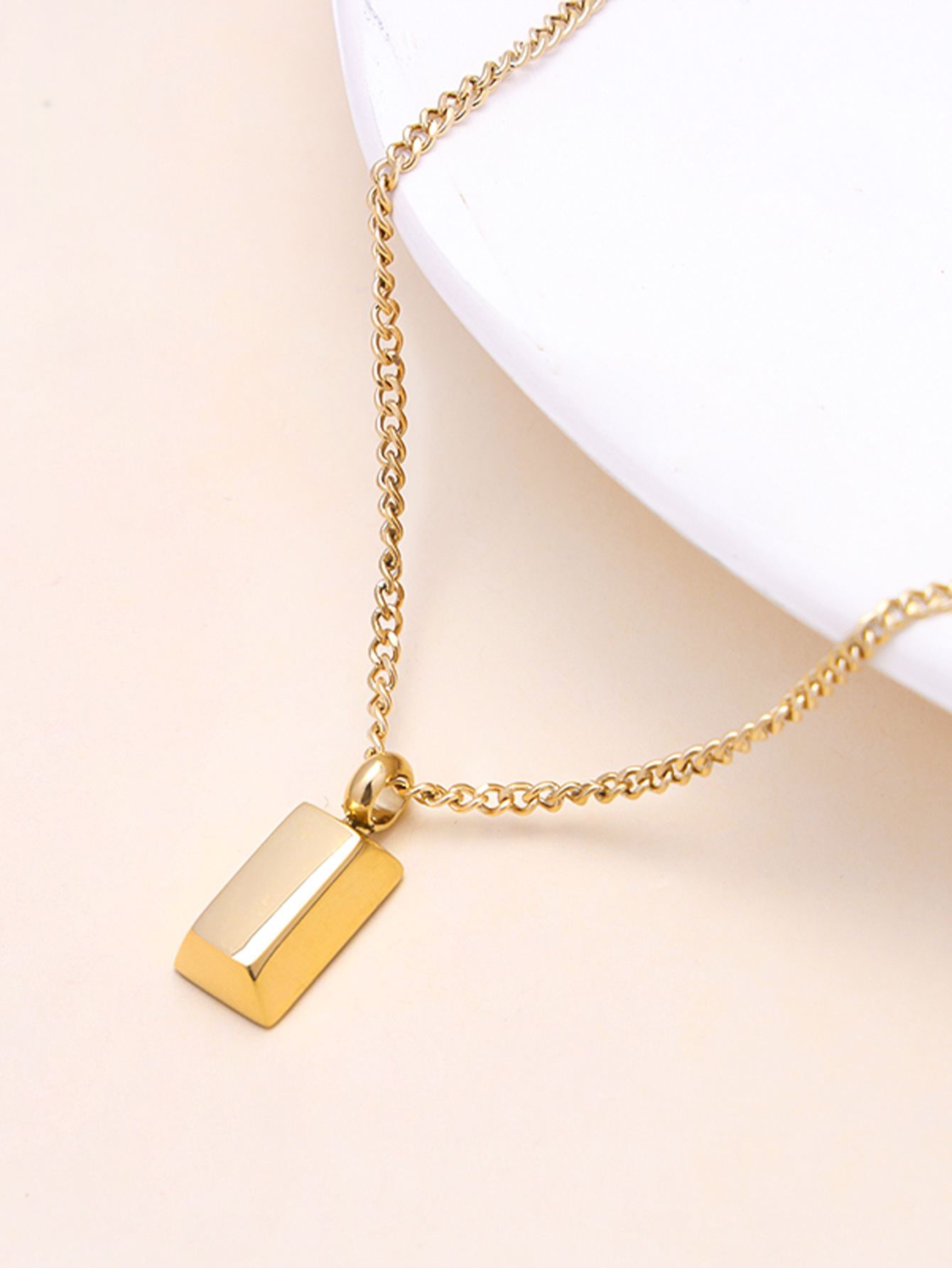 Small gold bar pendant