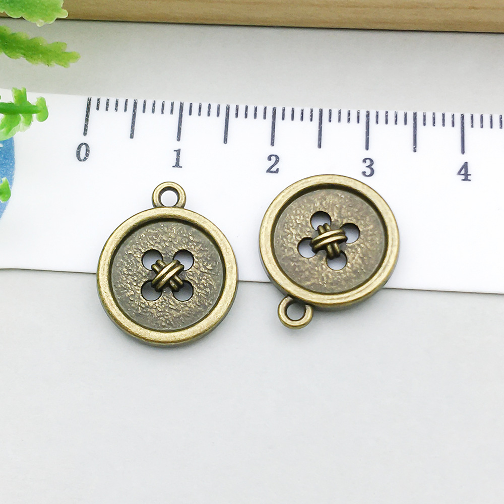 antique bronze button 14*17mm-1.4g-20280