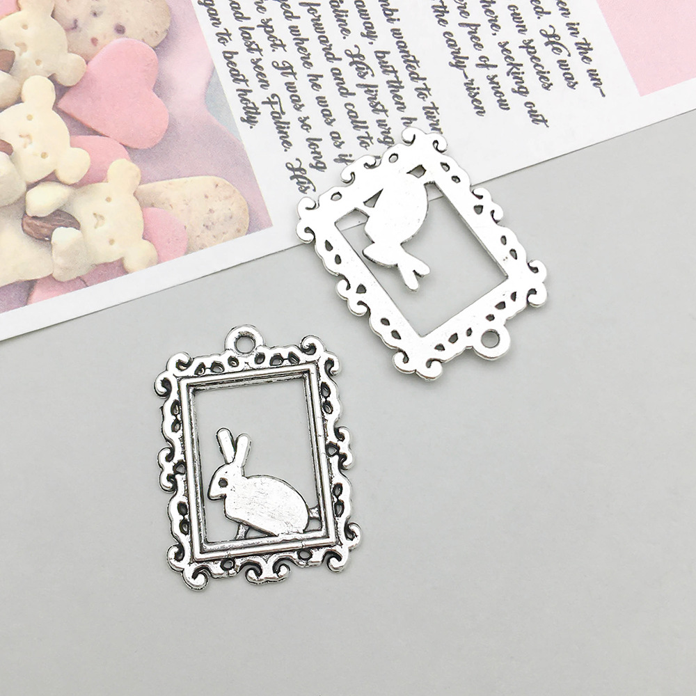 antique silver hollow rabbit frame 17*24mm-1.6g-5875