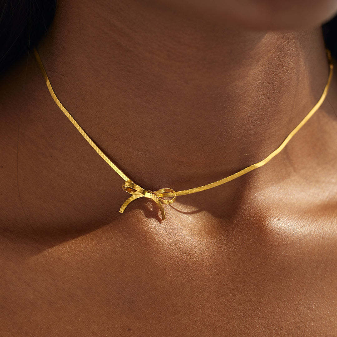 Clavicle chain bow gold