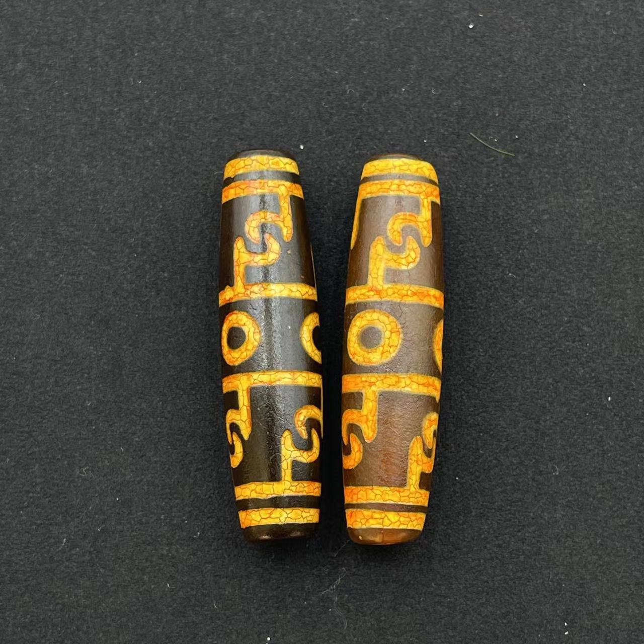 Lotus master three eyes dzi beads