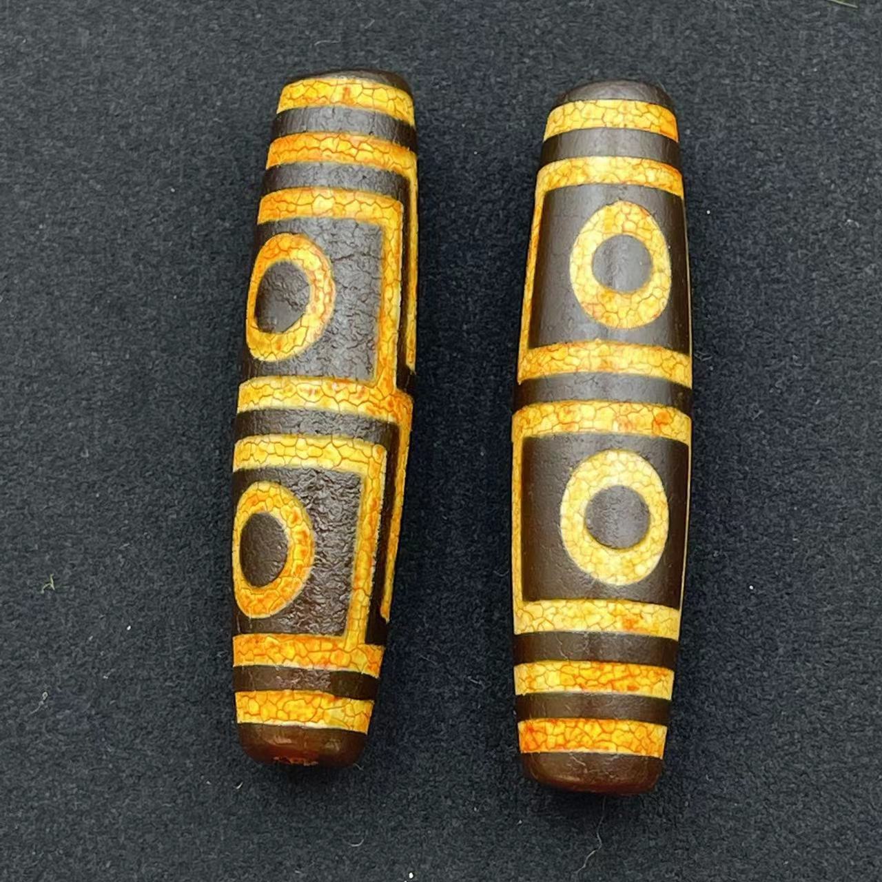 Four-eyed dzi beads