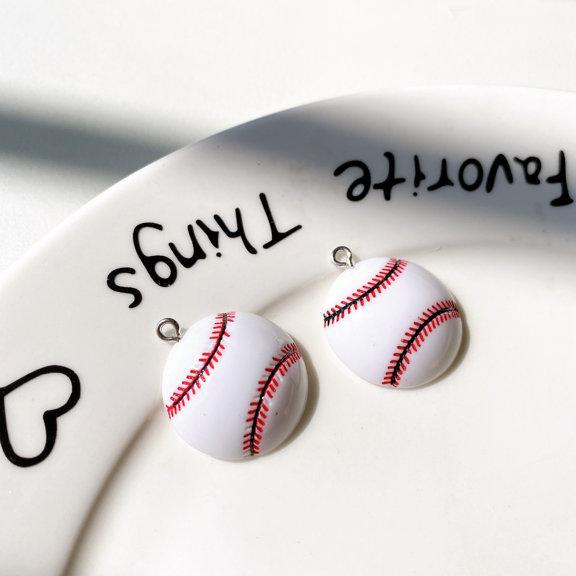 Red baseball white spikes