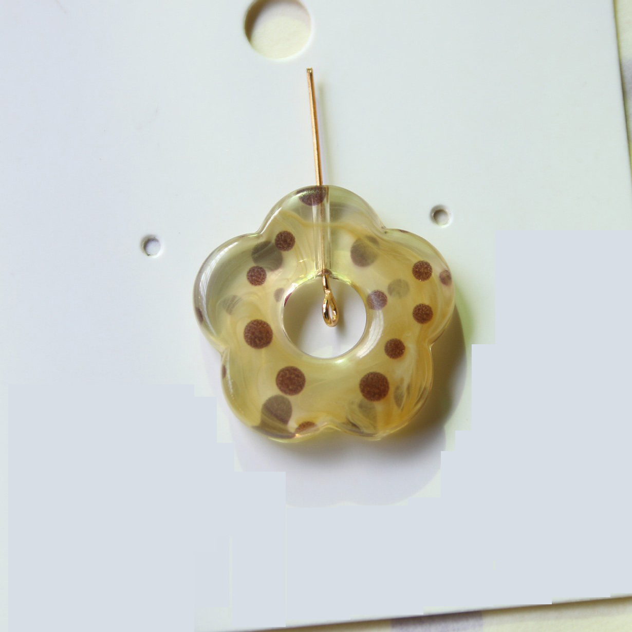 One yellow polka dot flower