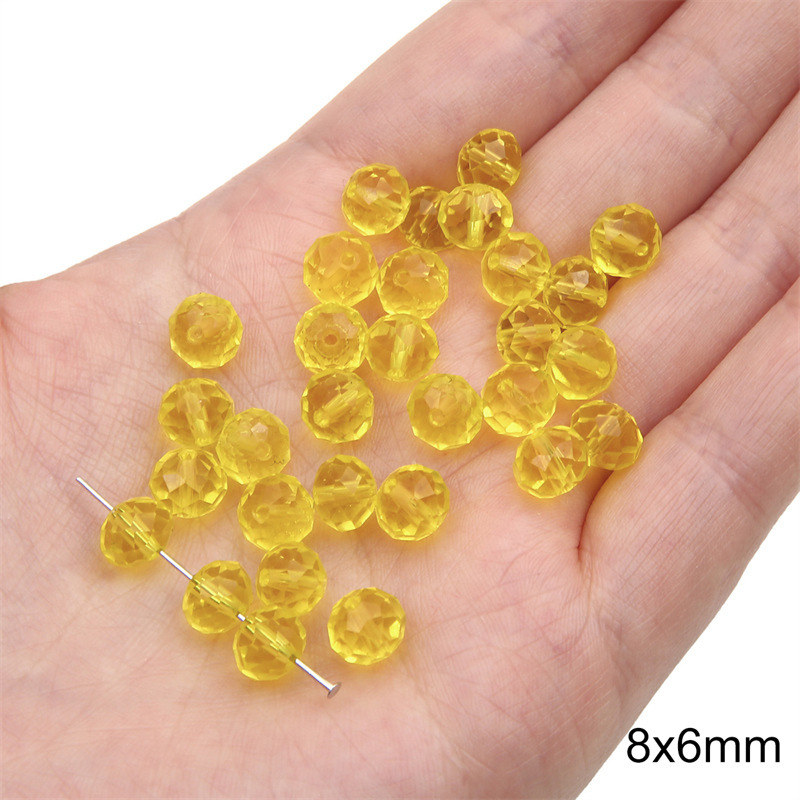 Transparent crystal wheel beads 8x 6mm aperture about 1mm yellow