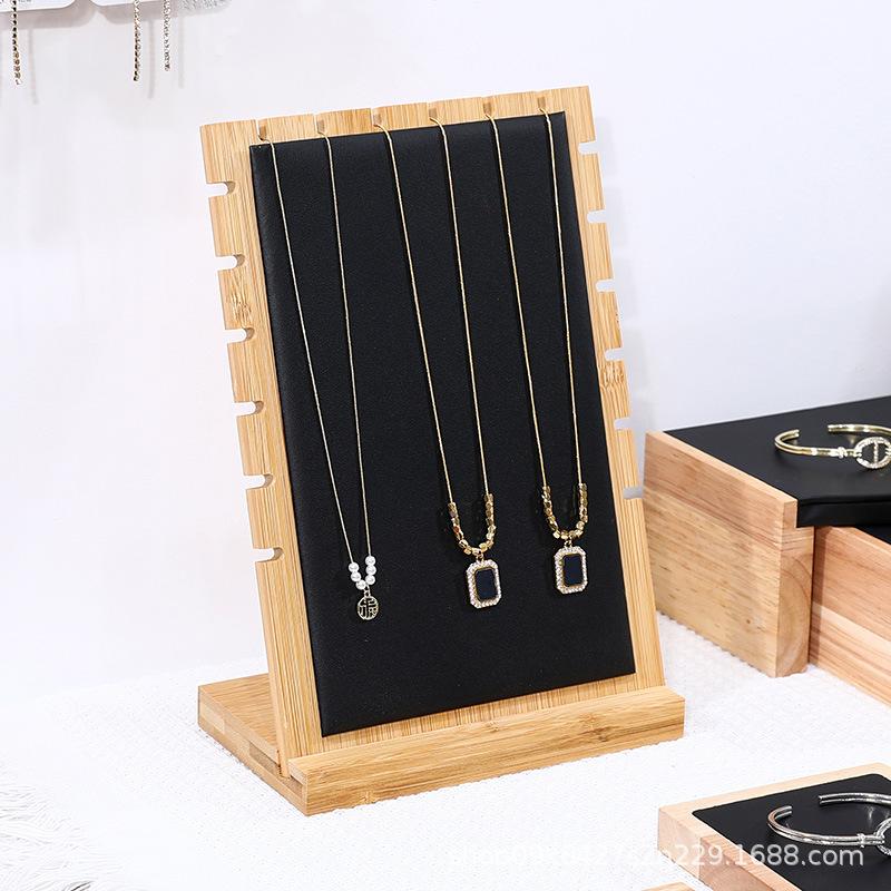 Black leather widened necklace stand