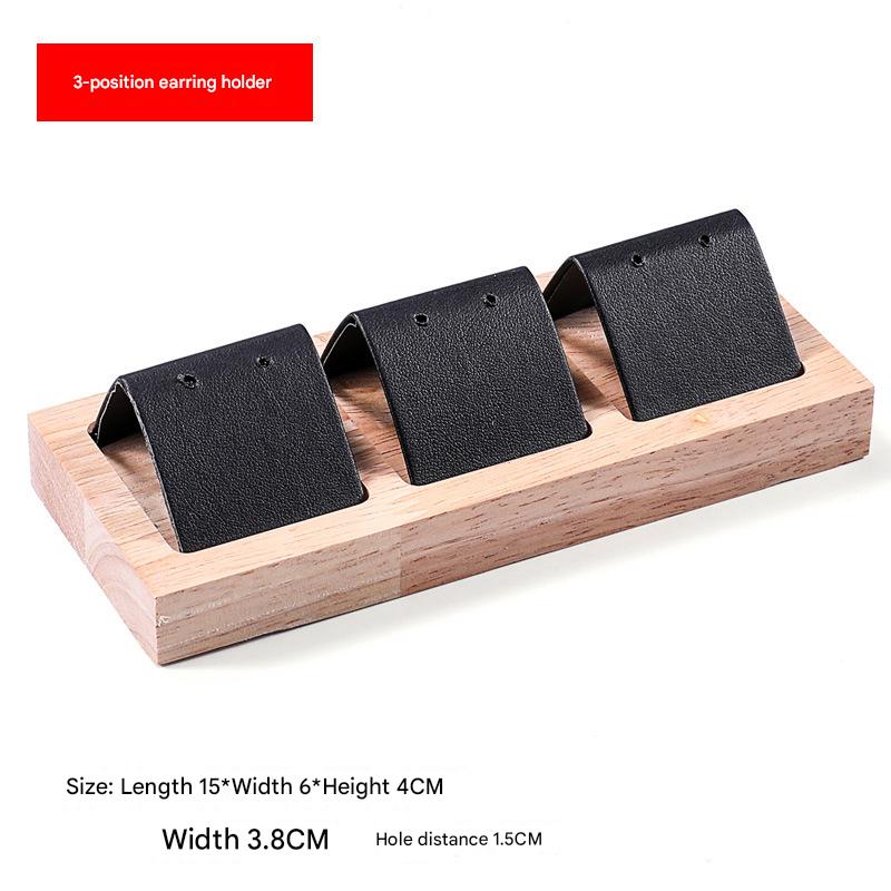 Black leather three-position earring base