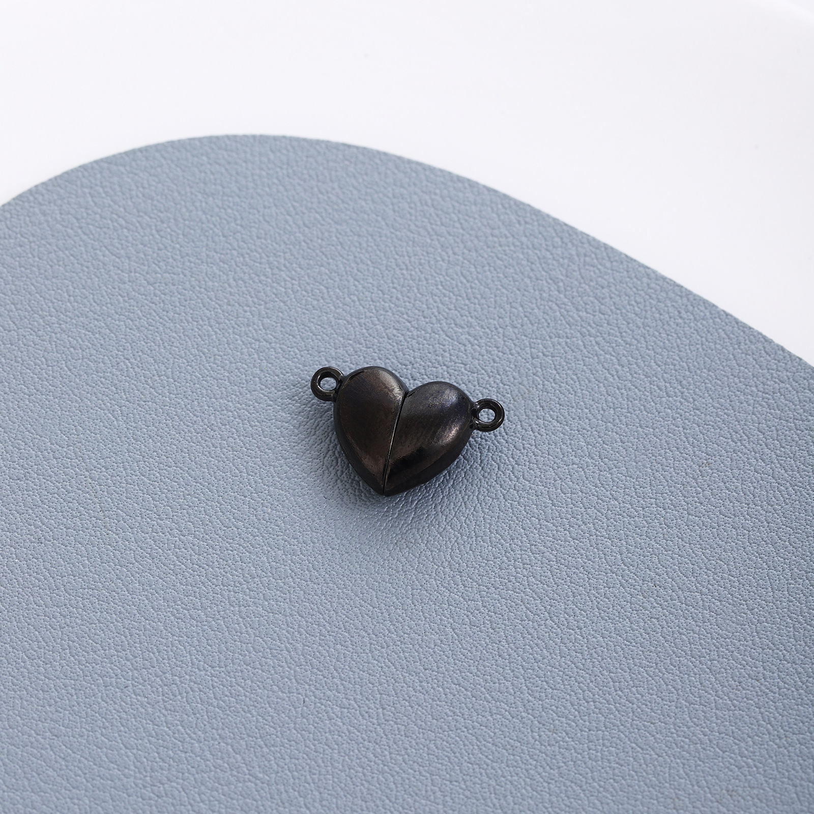 Stainless steel love magnet black