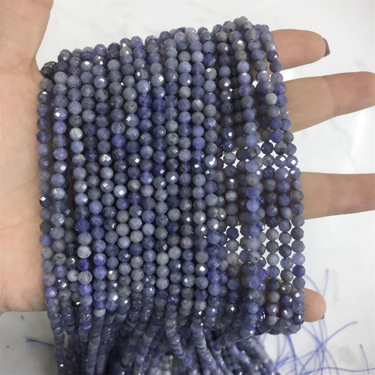 4mm faceted round bead tanzanite