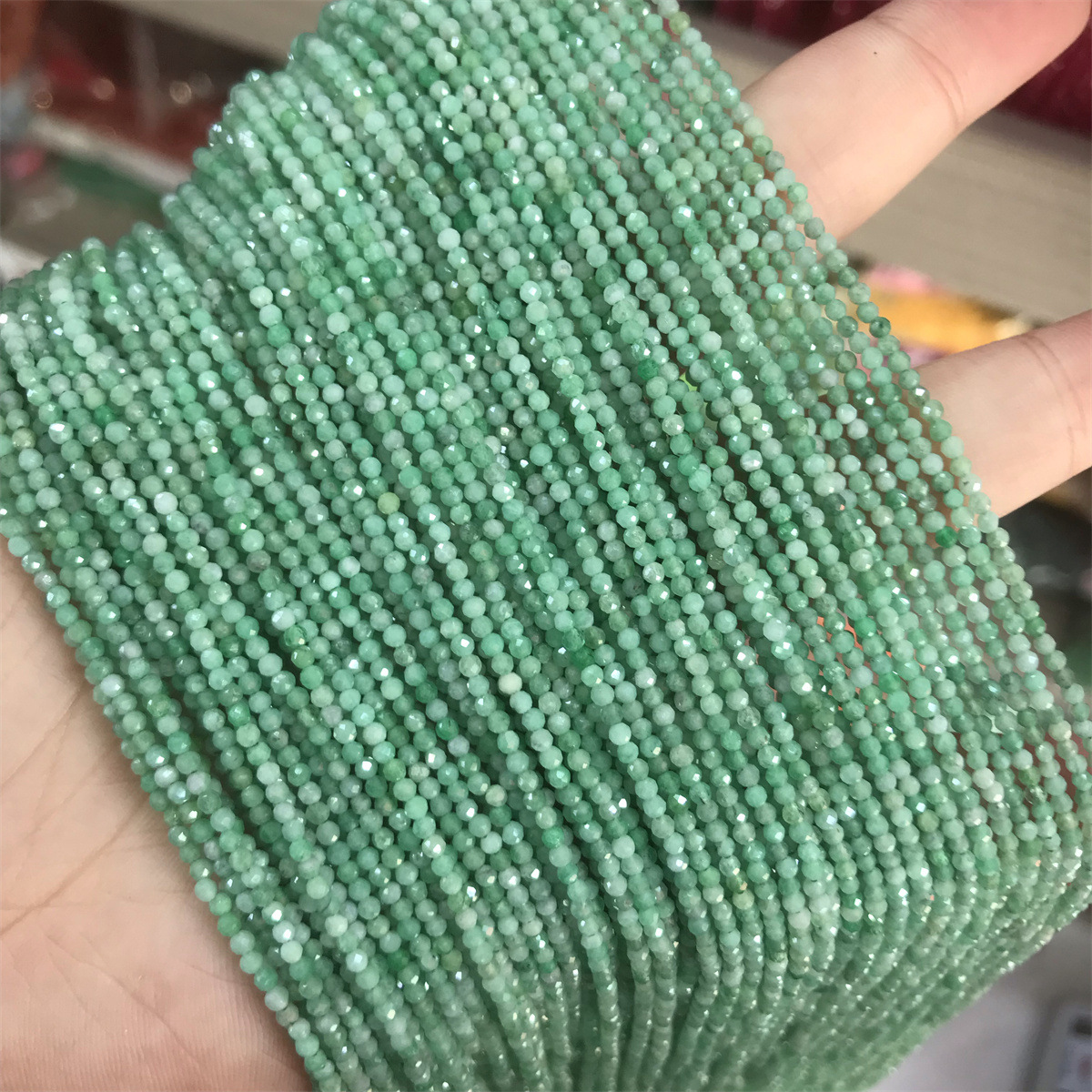 2mm faceted bead emerald
