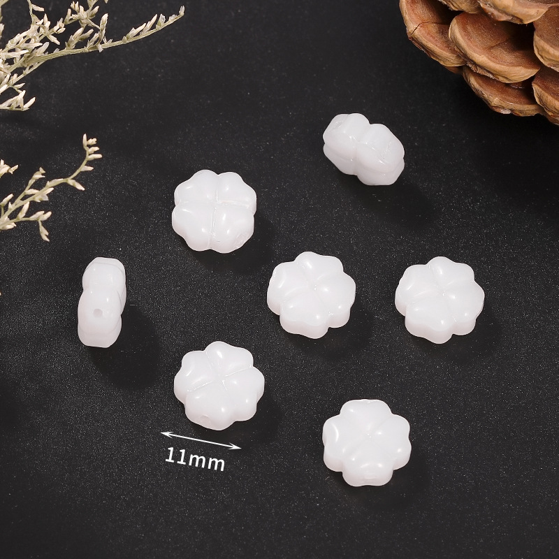 9 white four-petal flower 11mm