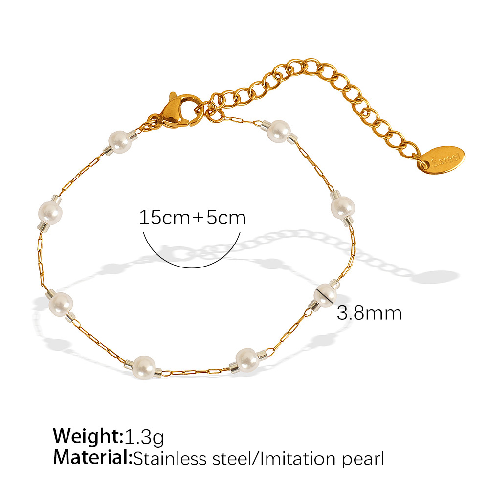 Sl85 white bead gold bracelet