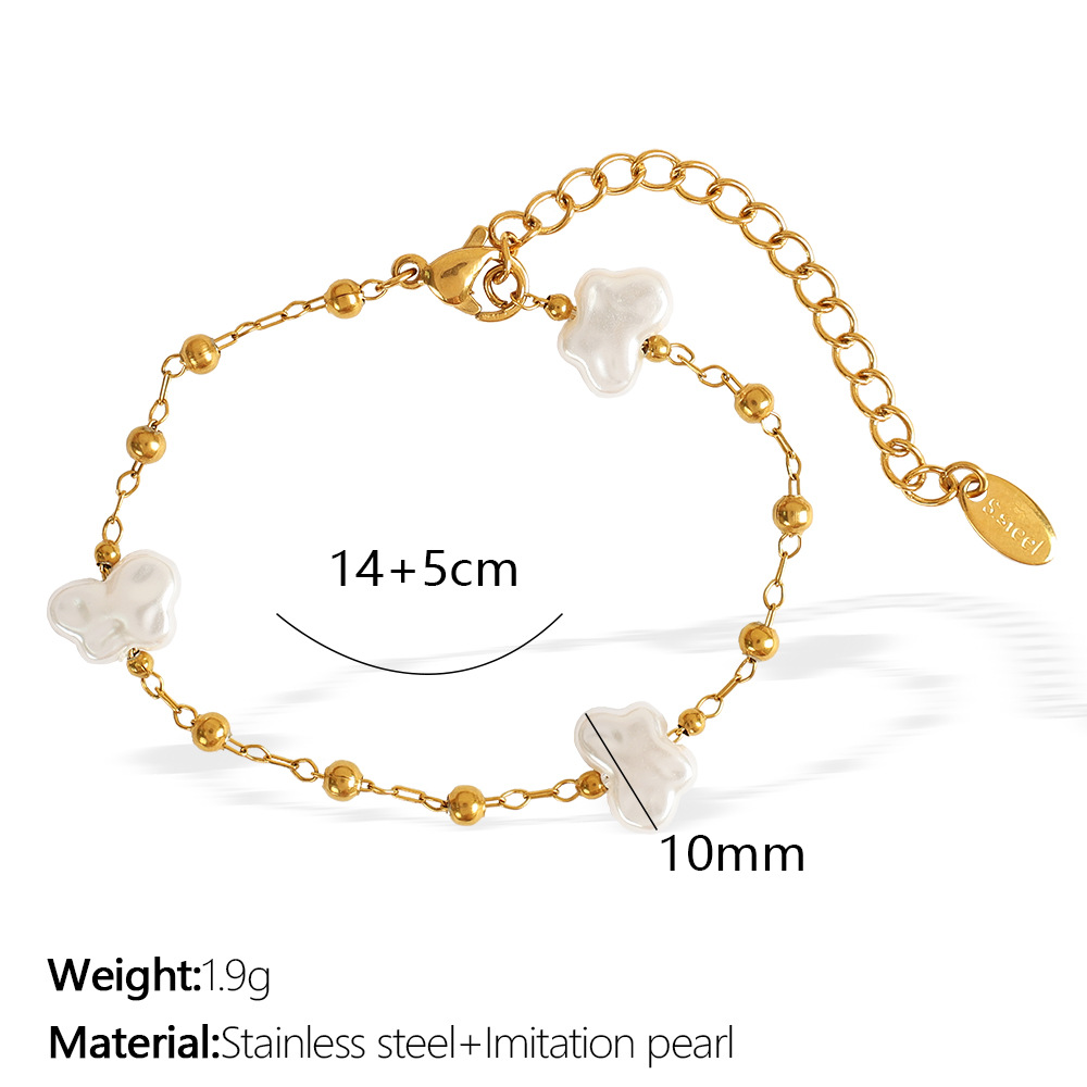 Sl92 white bead gold bracelet
