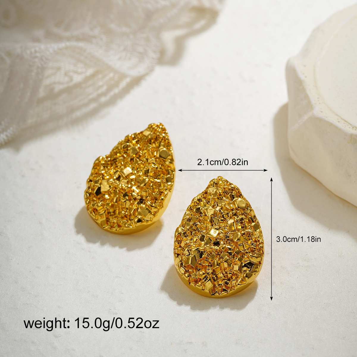 Golden oval gravel water droplets