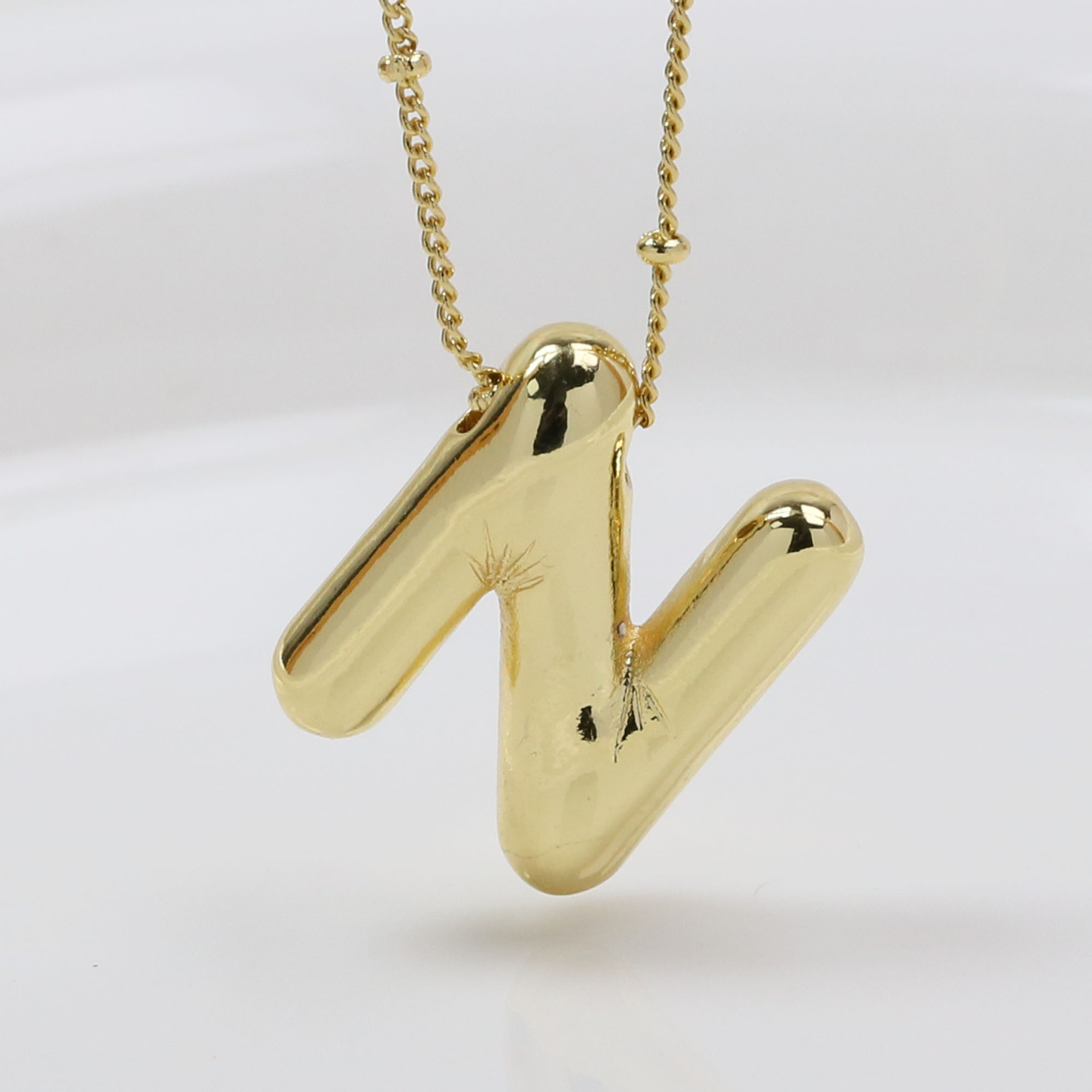 N (Necklace)