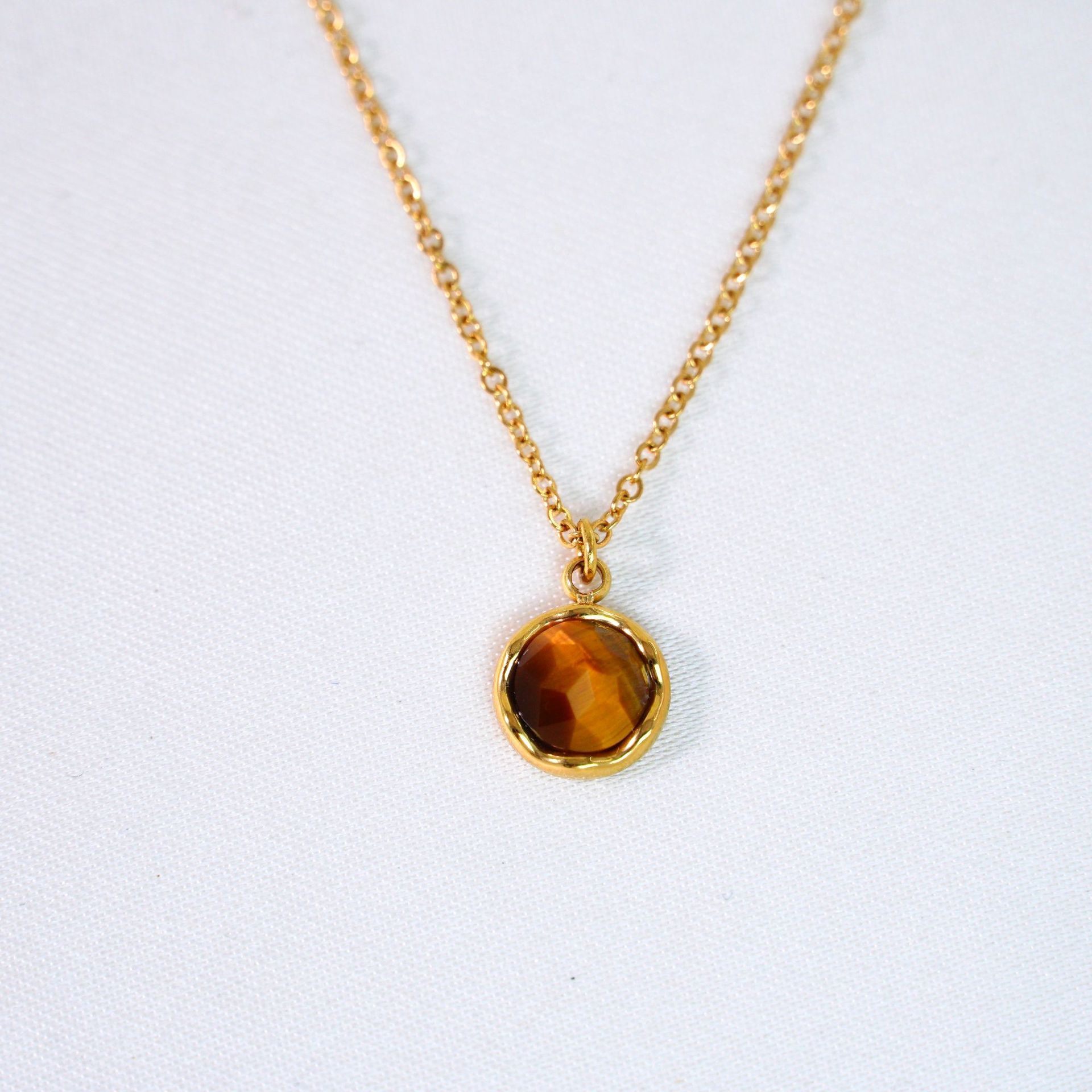Faceted yellow tiger stone