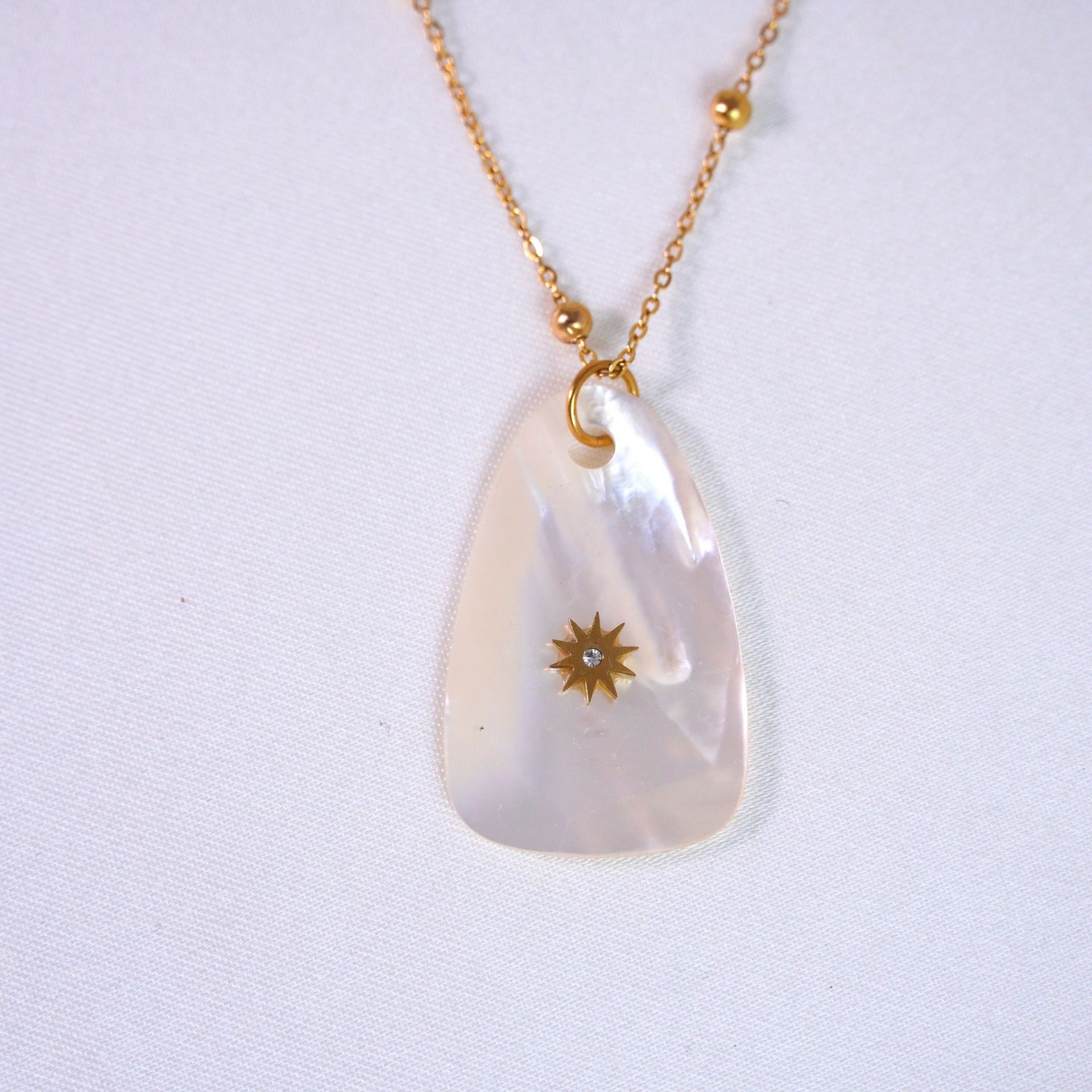 Faceted white shell