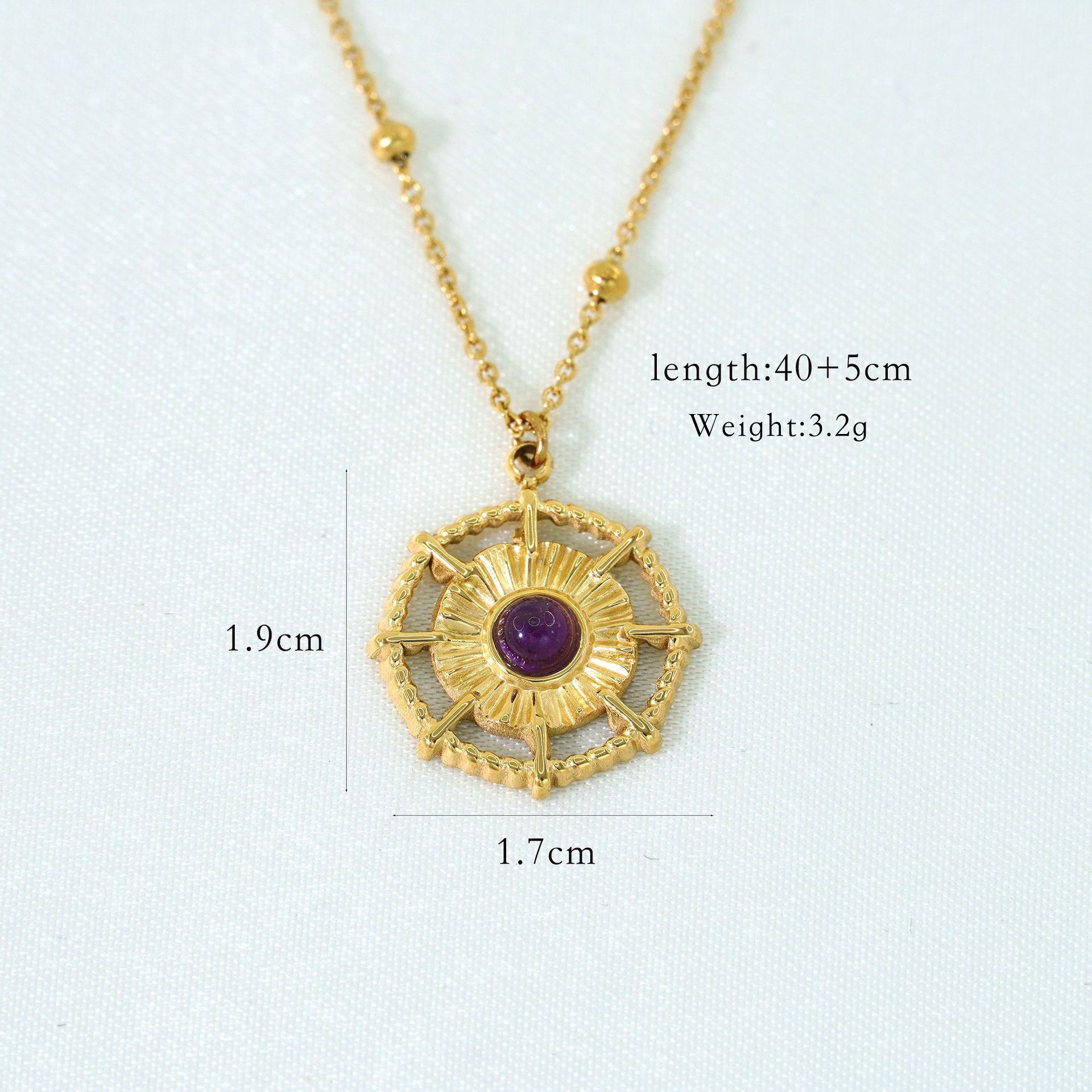Compass inlaid with amethyst