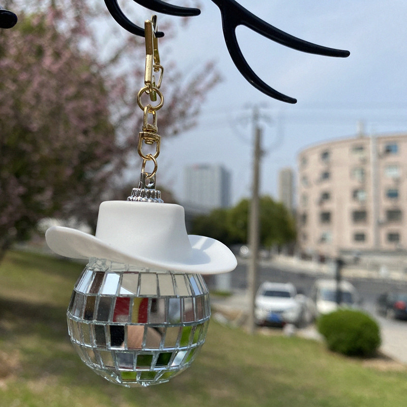White hat key chain