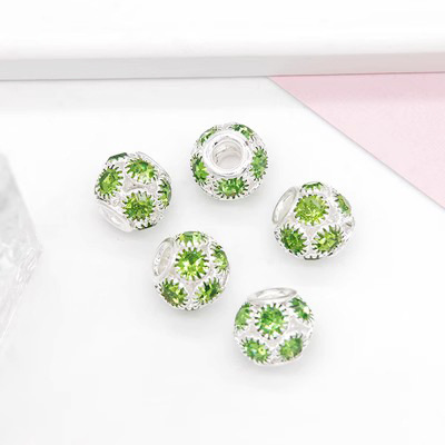 Silver base light green diamond