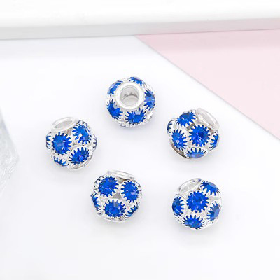 Silver base with sapphire blue diamonds