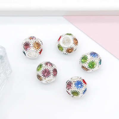 Silver base with mixed color diamonds