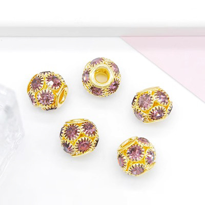 Light purple diamond with a gold base