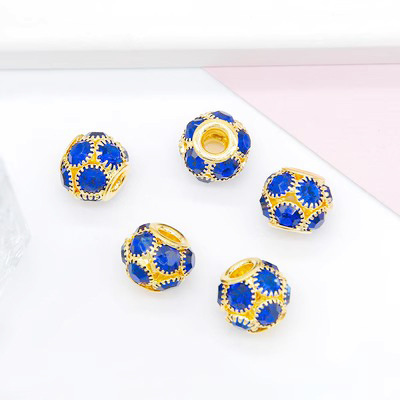 Gold base and sapphire blue diamond