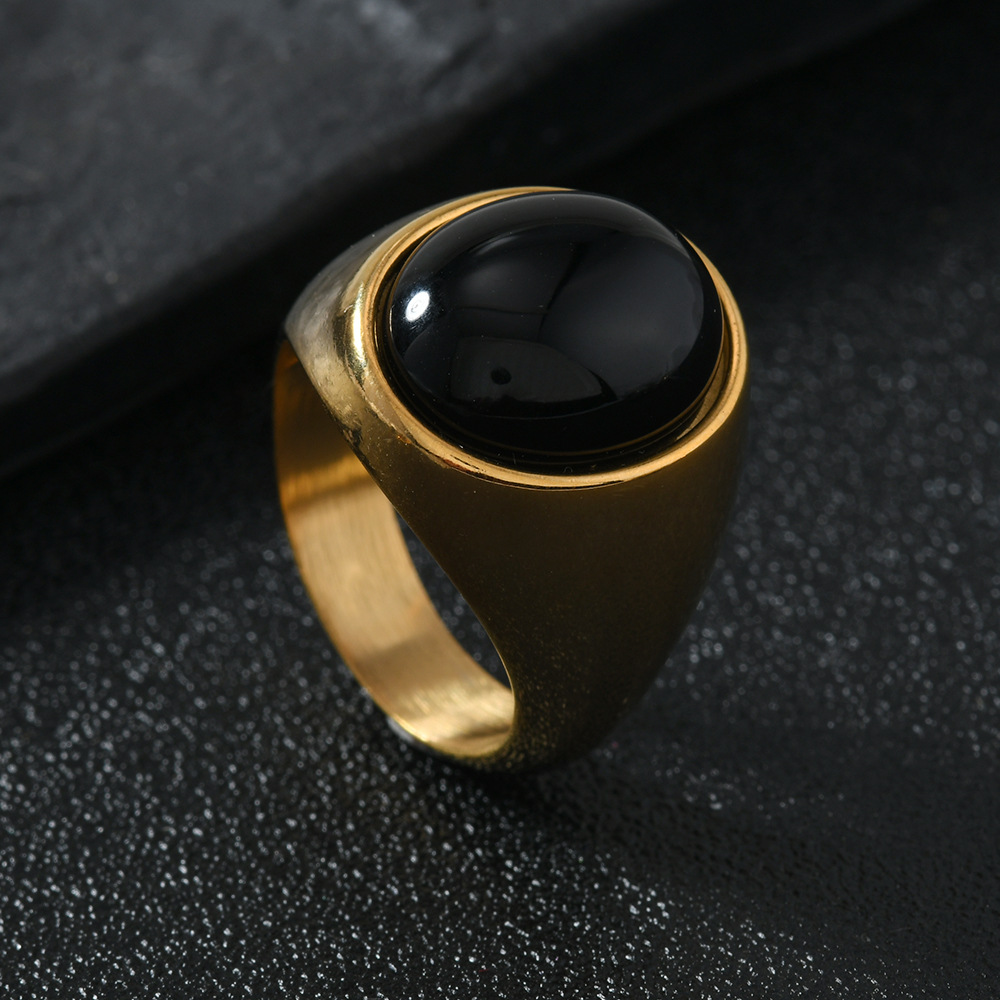 Gold (large oval black stone)
