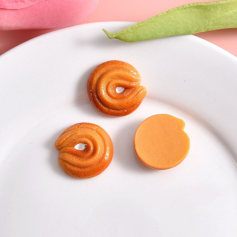 Heart-shaped yellow biscuit