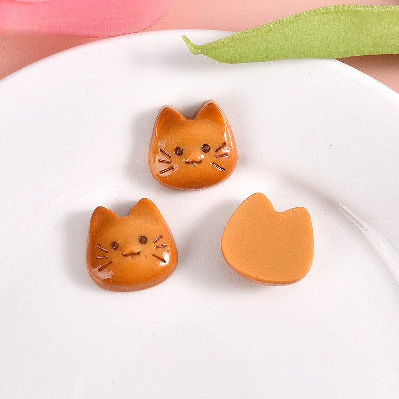 The cat's face is light brown