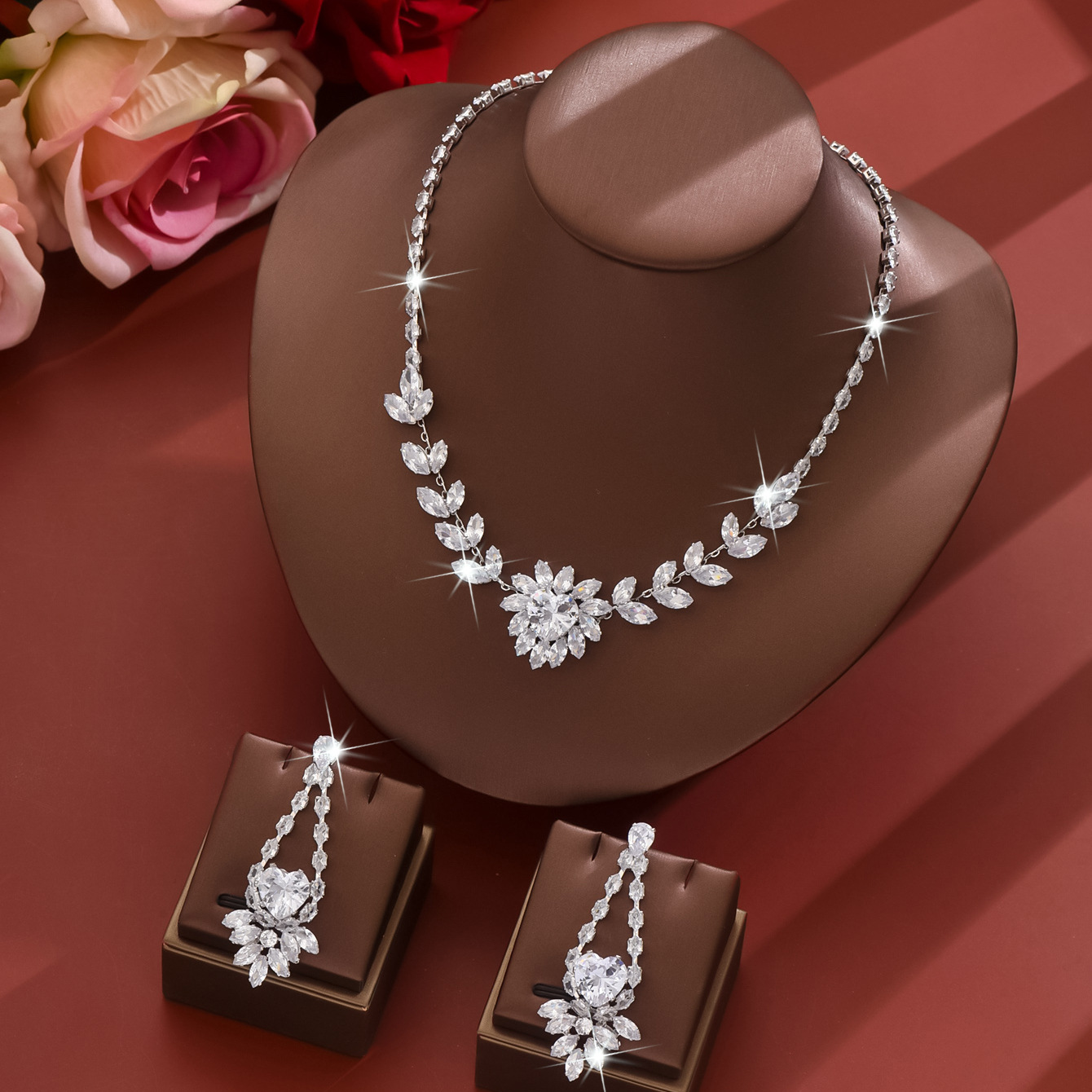 white necklace and earrings