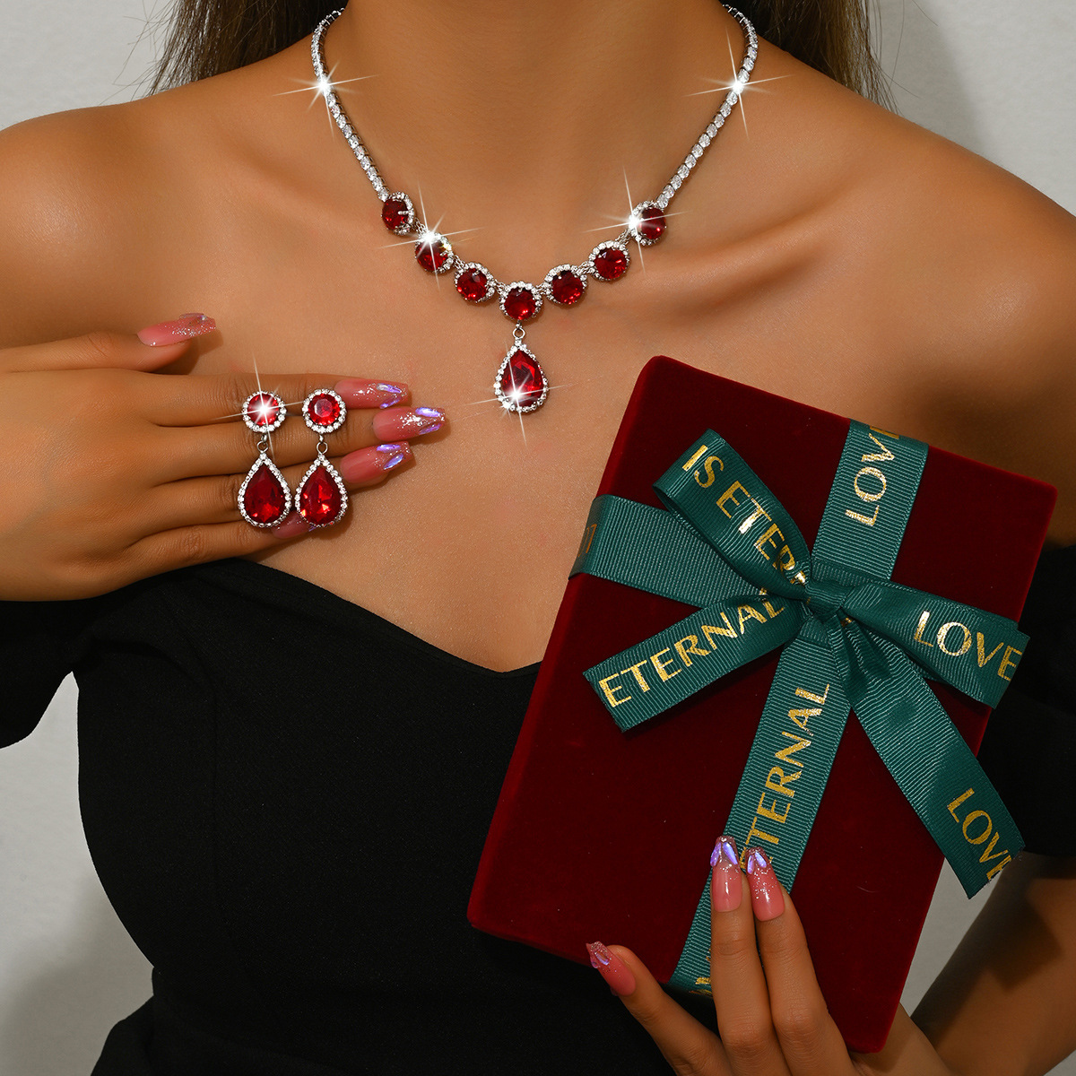 red necklace   earrings   large red box