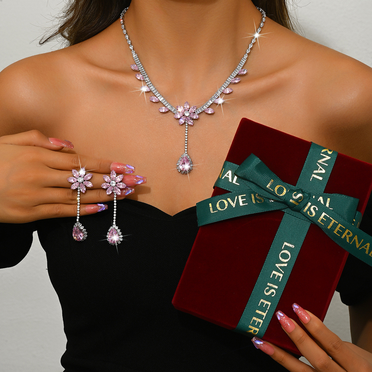 pink necklace   earrings   large red box