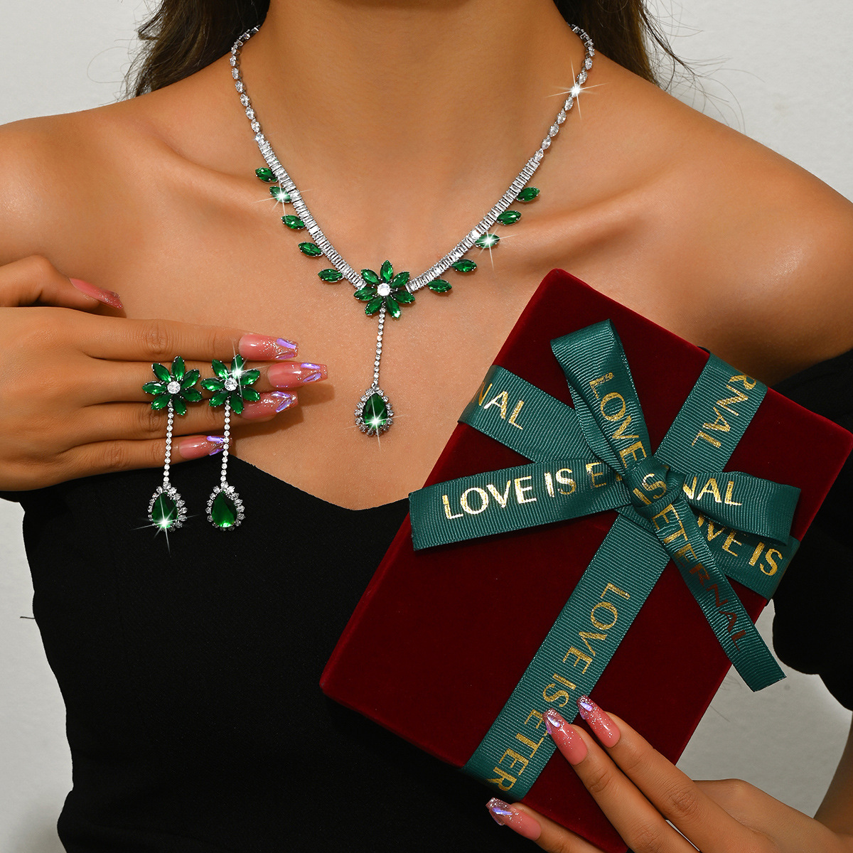 green necklace   earrings   large red box