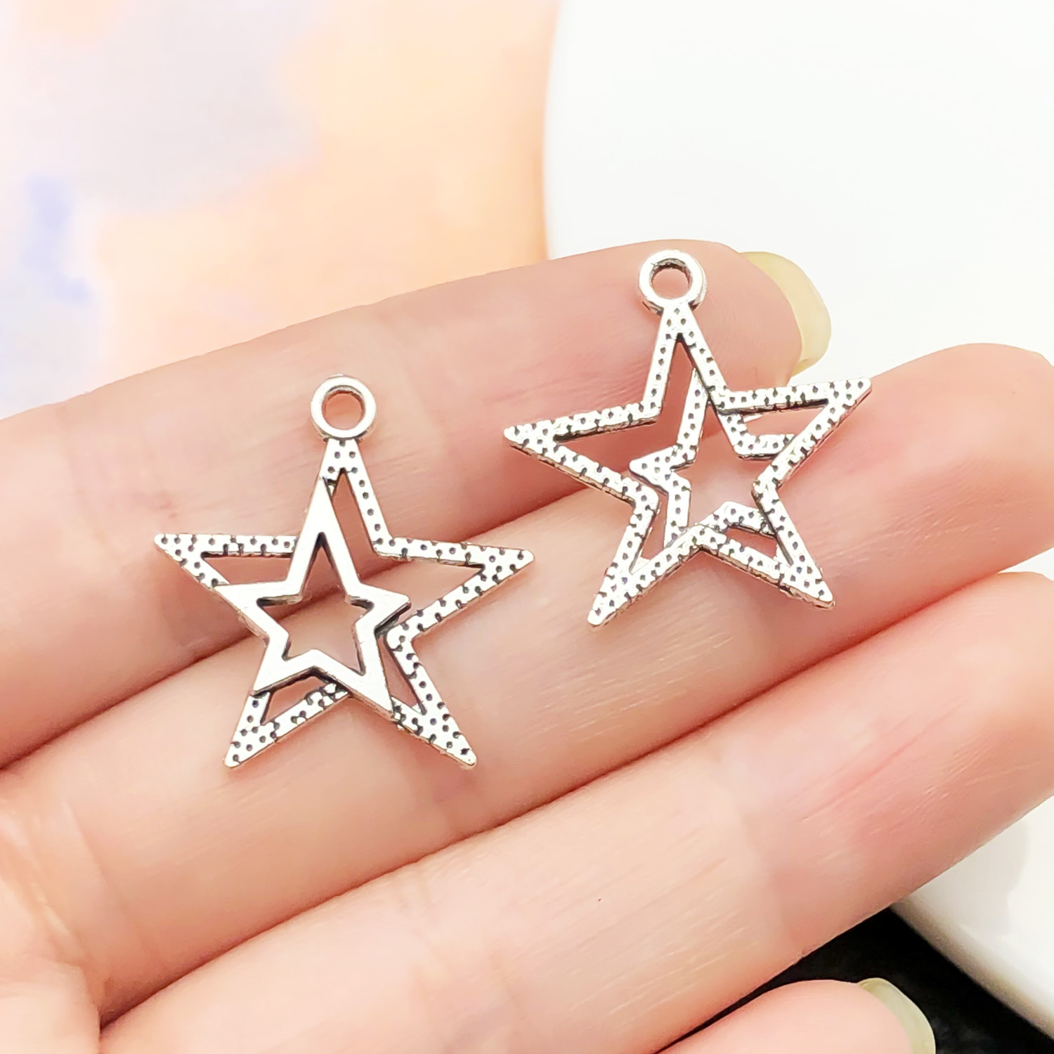 22335-1 ancient silver zinc alloy single-sided five-pointed star 22x20mm-0.8g (small star on the left)