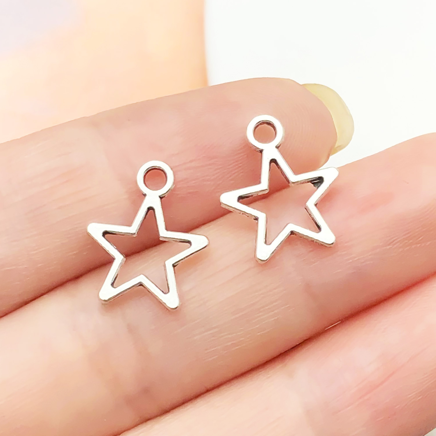 22344-1 thin antique silver zinc alloy star 14x12mm-0.35g