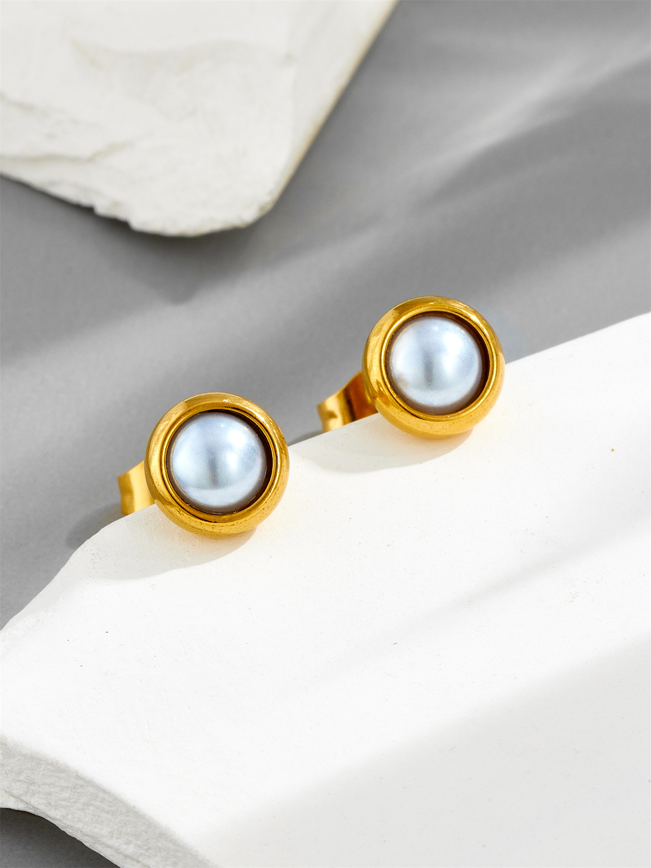 White pearl stud earrings