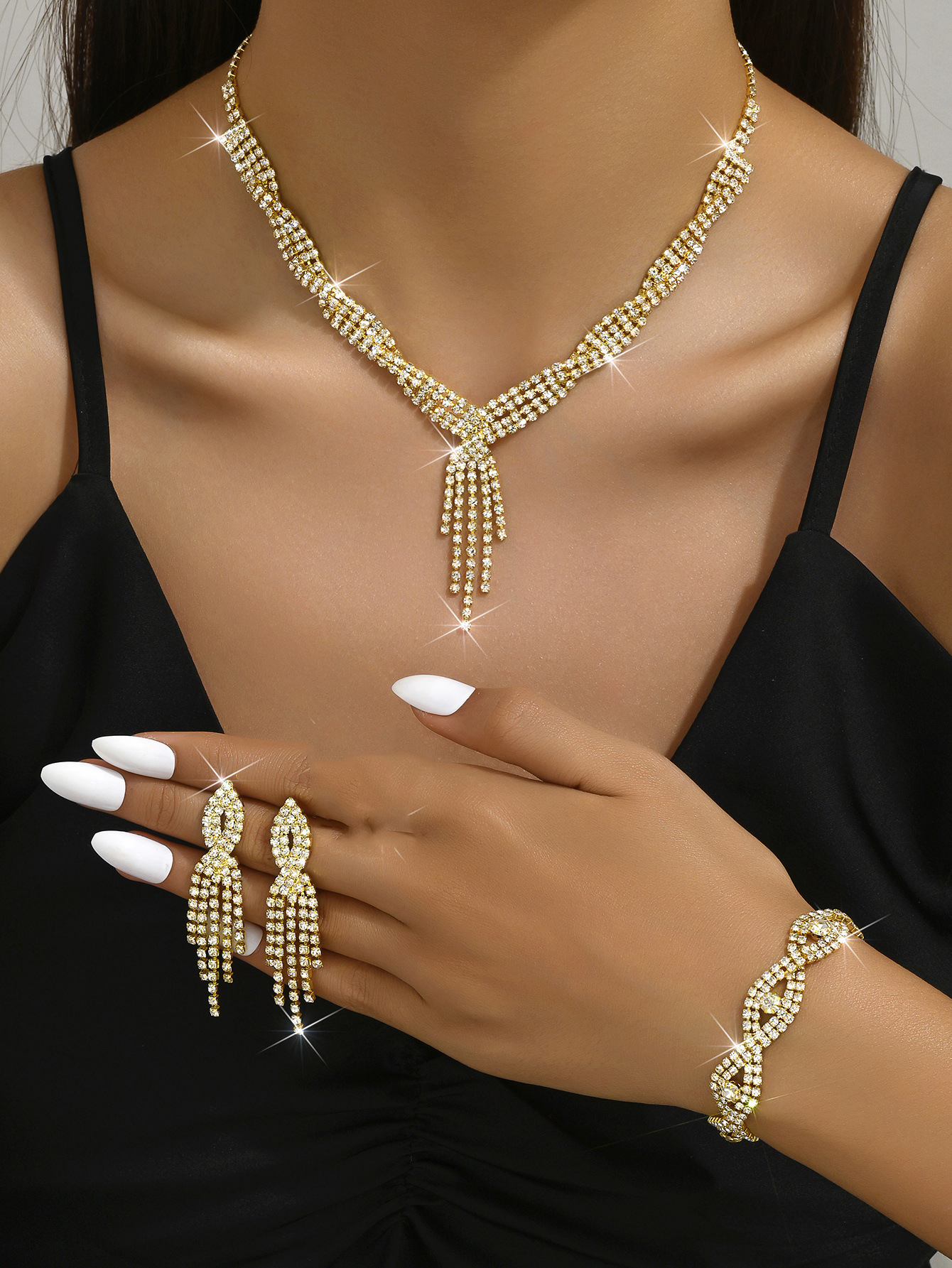 E gold necklace earrings bracelet